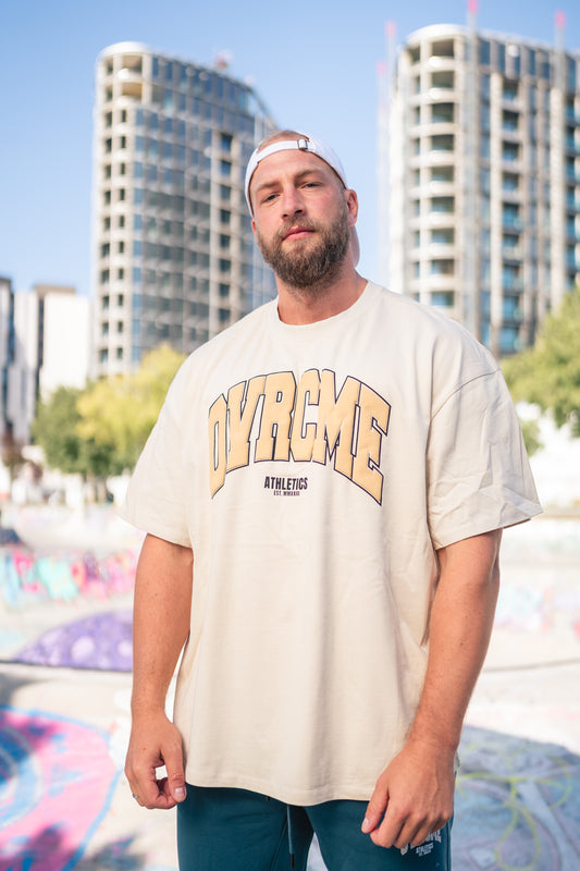 DROP01 OVRCME STATEMENT T Shirt sand - OVRCME ATHLETICS