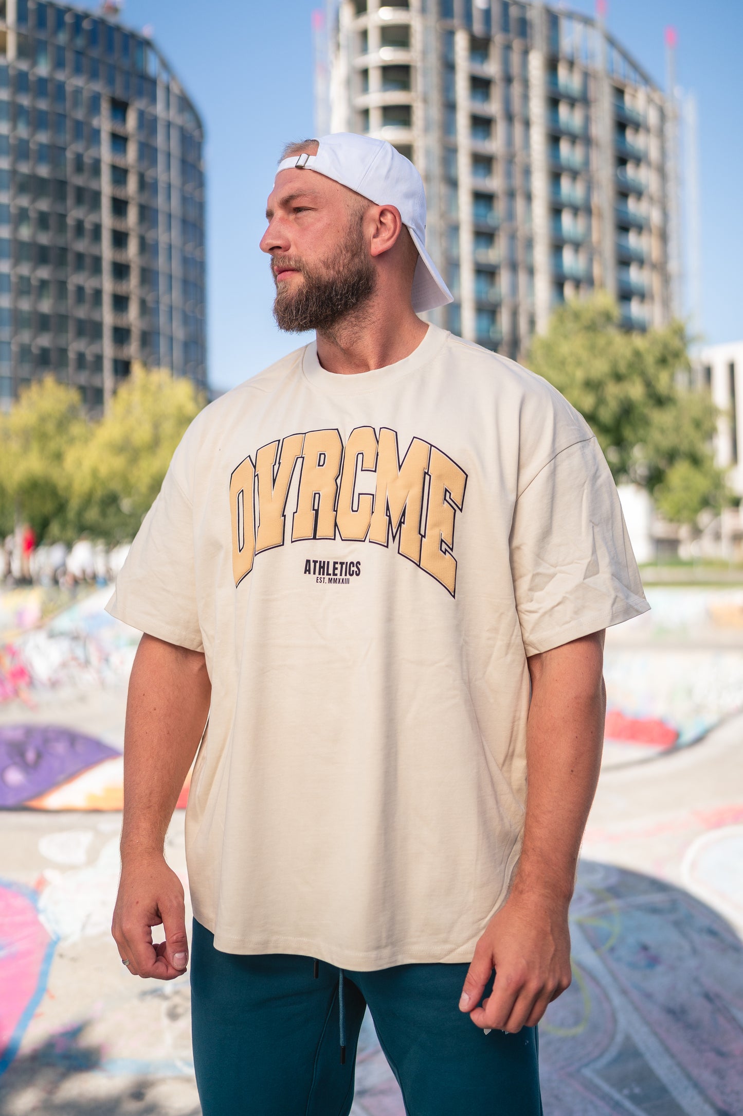 DROP01 OVRCME STATEMENT T Shirt sand - OVRCME ATHLETICS